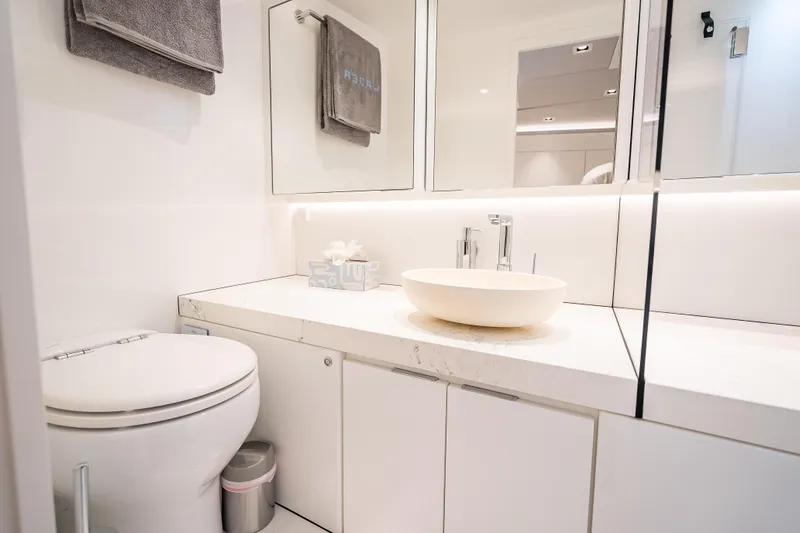 Why Her Yacht Photos Pics Luxurious bathroom interior of 2024 Wajer 55 HT yacht, featuring modern fixtures and elegant design.