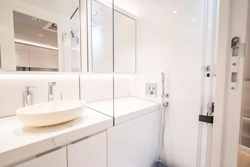Why Her Yacht Photos Pics Luxurious bathroom interior of 2024 Wajer 55 HT yacht, featuring modern sink and fixtures.