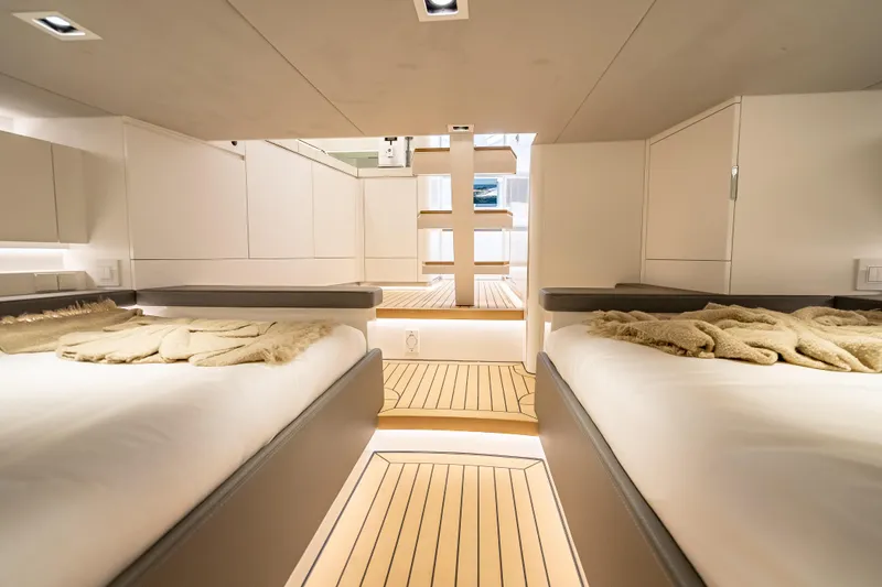 Why Her Yacht Photos Pics Luxurious interior of 2024 Wajer 55 HT yacht with twin beds and modern design.