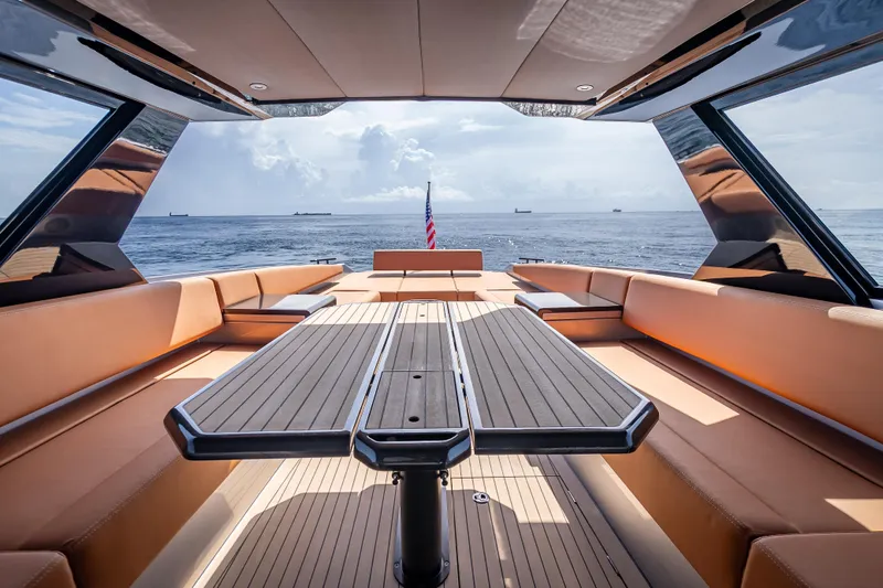 Why Her Yacht Photos Pics Luxurious 2024 Wajer 55 HT yacht interior with ocean view and elegant seating.