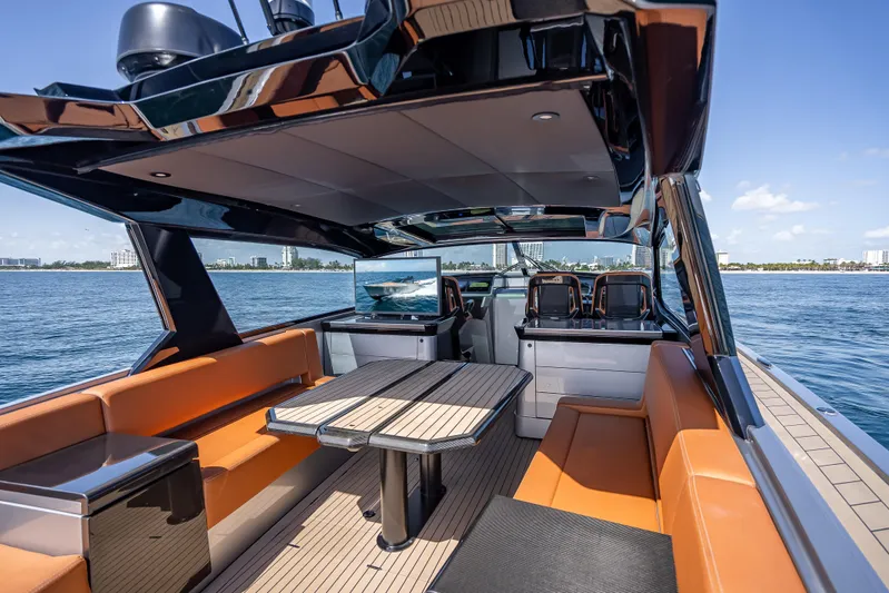 Why Her Yacht Photos Pics Luxurious 2024 Wajer 55 HT yacht interior with sleek seating and ocean view.
