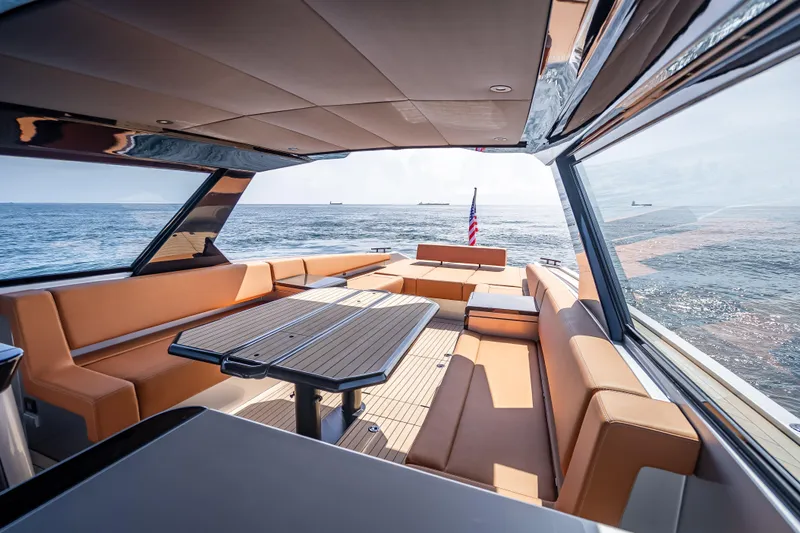 Why Her Yacht Photos Pics Luxurious 2024 Wajer 55 HT yacht interior with elegant seating and ocean view.