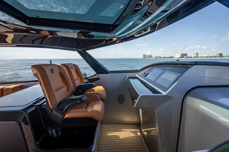 Why Her Yacht Photos Pics Interior of 2024 Wajer 55 HT yacht with luxurious seating and modern dashboard.