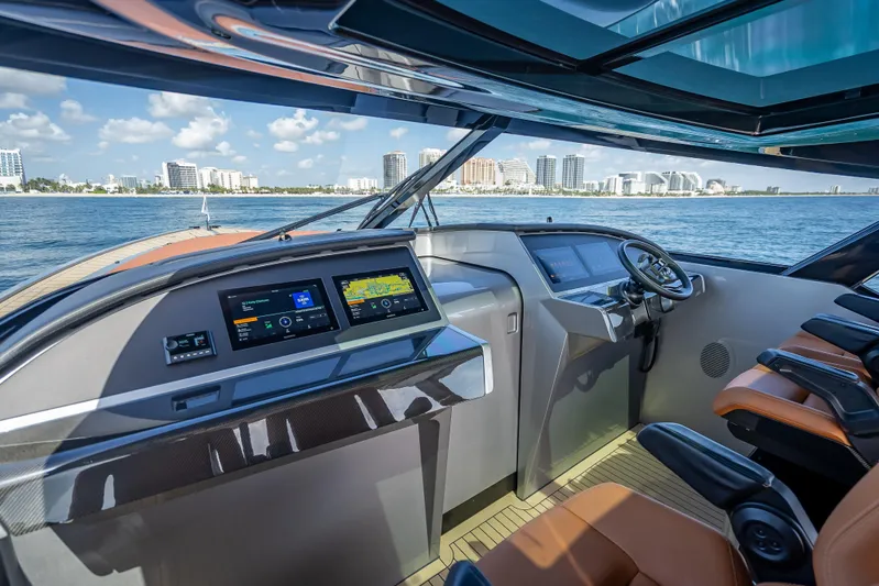 Why Her Yacht Photos Pics Luxurious 2024 Wajer 55 HT yacht cockpit with modern navigation displays and ocean view.
