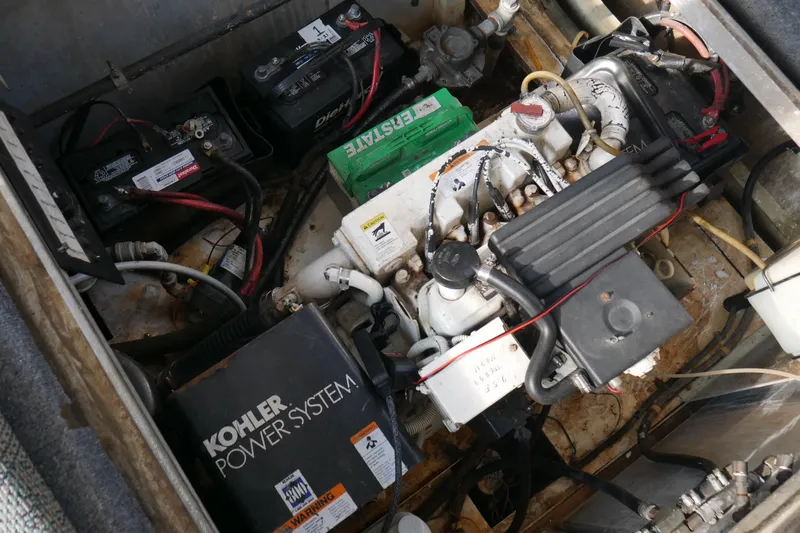  Yacht Photos Pics Engine compartment of a 1996 STARDUST Cruiser with Kohler power system and multiple batteries.