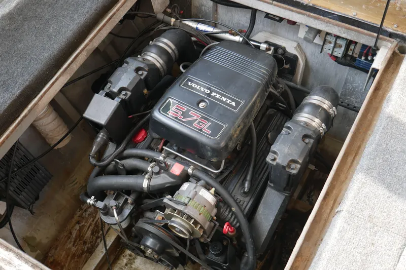  Yacht Photos Pics Engine compartment of a 1996 STARDUST Cruiser with Volvo Penta 5.7L engine.