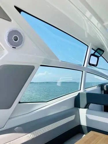 Yacht Photos Pics Interior view of 2024 Beneteau 36 Gran Turismo GT yacht with ocean backdrop.
