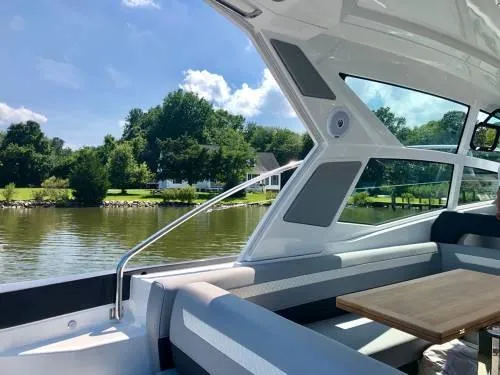  Yacht Photos Pics Interior view of 2024 Beneteau 36 Gran Turismo GT yacht with scenic water backdrop.