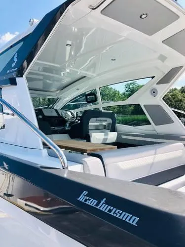  Yacht Photos Pics 2024 Beneteau 36 Gran Turismo GT luxury yacht interior with modern seating and sleek design.