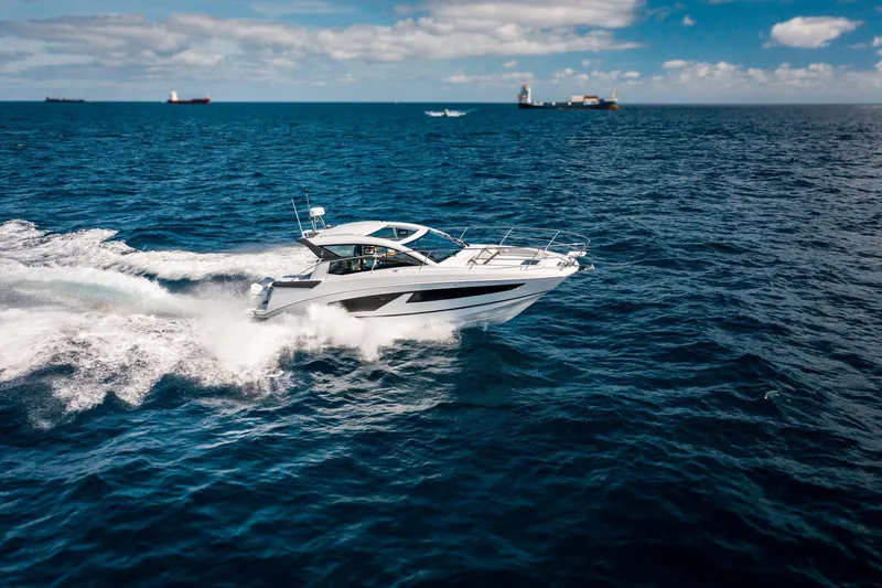  Yacht Photos Pics 2024 Beneteau 36 Gran Turismo GT cruising on open water.