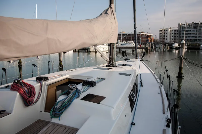 Alias Yacht Photos Pics 2014 Adria ORCA 50 sailboat docked in a marina, featuring a sleek deck design.