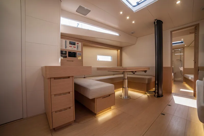 Alias Yacht Photos Pics Modern interior of 2014 Adria ORCA 50 yacht with sleek wooden furnishings and ambient lighting.