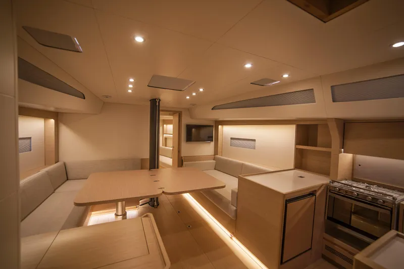 Alias Yacht Photos Pics Luxurious interior of 2014 Adria ORCA 50 yacht with modern kitchen and seating area.