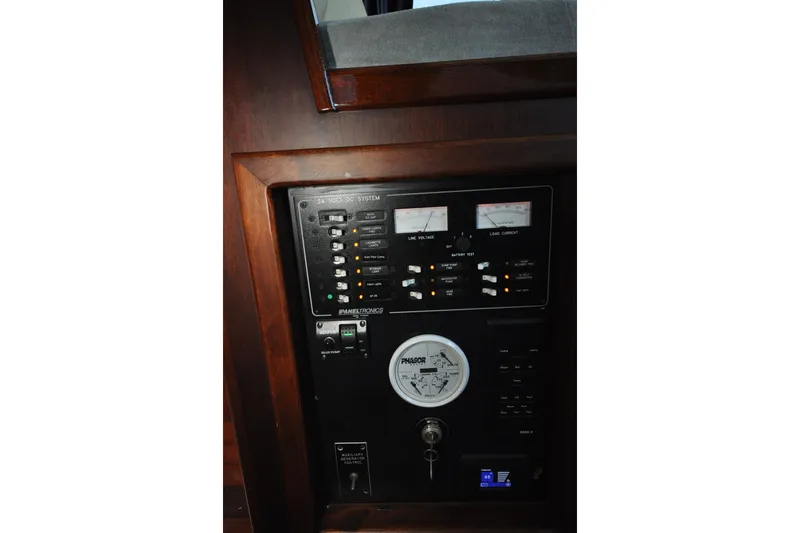 In The Flow Yacht Photos Pics Control panel of 1982 Custom Virpack Steelhull boat with gauges and switches.