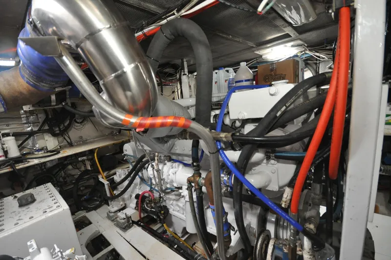 In The Flow Yacht Photos Pics Engine room of 1982 Custom Virpack Steelhull with visible pipes and machinery.