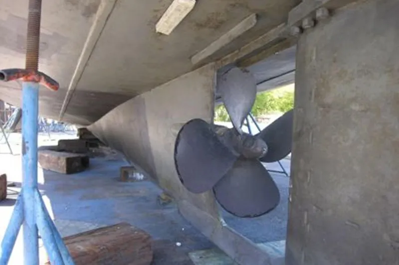 In The Flow Yacht Photos Pics Underwater view of 1982 Custom Virpack Steelhull propeller and rudder on dry dock.