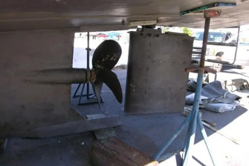 In The Flow Yacht Photos Pics Underwater view of 1982 Custom Virpack Steelhull boat propeller and rudder.