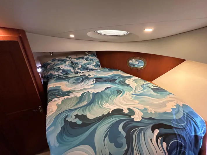 Ps Thank You Yacht Photos Pics Luxurious 2004 Silverton 39 Motor Yacht bedroom with ocean-themed bedding.