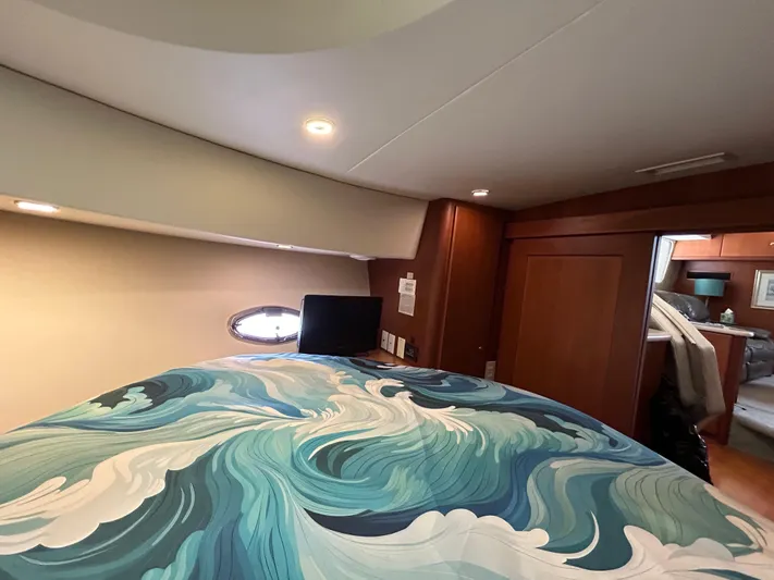 Ps Thank You Yacht Photos Pics Luxurious 2004 Silverton 39 Motor Yacht bedroom with ocean-themed bedding.