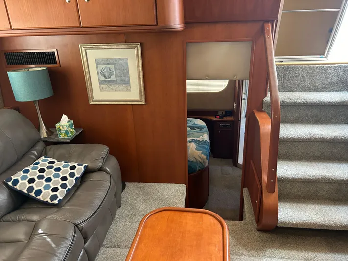 Ps Thank You Yacht Photos Pics Interior of 2004 Silverton 39 Motor Yacht with cozy seating and stairs.