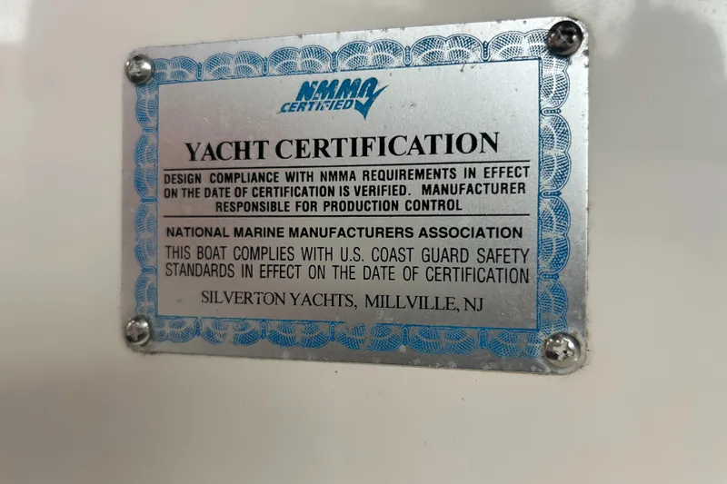 Ps Thank You Yacht Photos Pics 2004 Silverton 39 Motor Yacht certification plaque, NMMA compliance, U.S. Coast Guard safety standards.