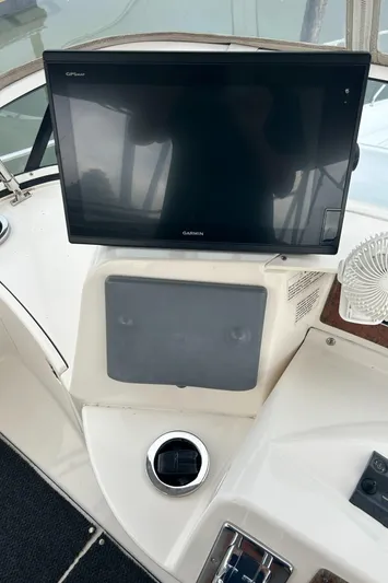 Ps Thank You Yacht Photos Pics 2004 Silverton 39 Motor Yacht helm with navigation screen and controls.