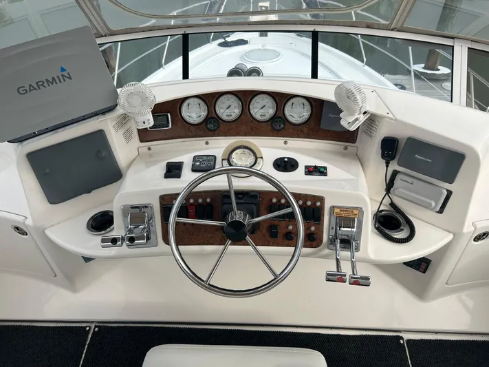 Ps Thank You Yacht Photos Pics 2004 Silverton 39 Motor Yacht helm with Garmin navigation system and control panel.