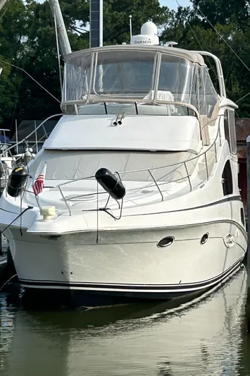 Ps Thank You Yacht Photos Pics 2004 Silverton 39 Motor Yacht docked in a marina.