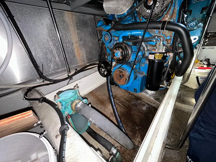 Ps Thank You Yacht Photos Pics Engine room of 2004 Silverton 39 Motor Yacht, showcasing mechanical components and hoses.
