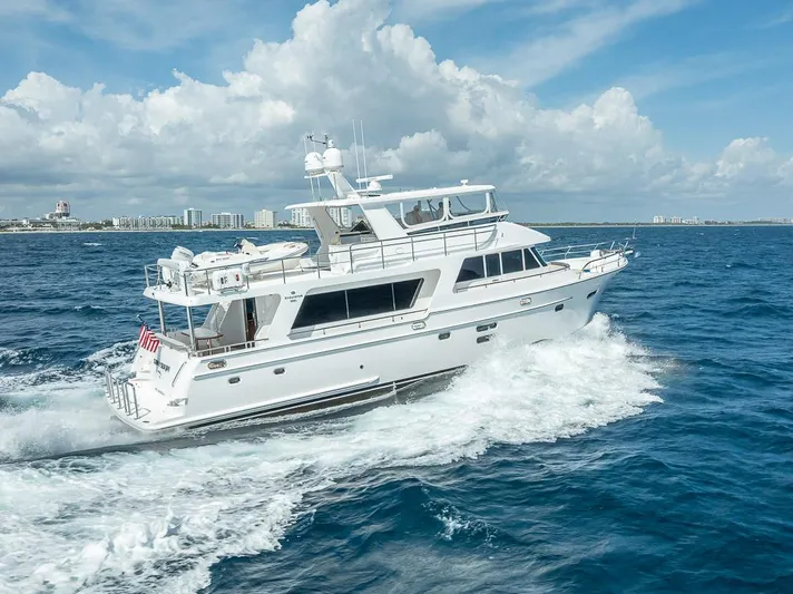 Sunny Seajay Yacht Photos Pics 2022 Hampton 658l Endurance yacht cruising on open ocean under clear skies.