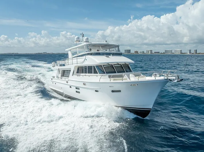 Sunny Seajay Yacht Photos Pics 2022 Hampton 658l Endurance yacht cruising on open sea under clear skies.
