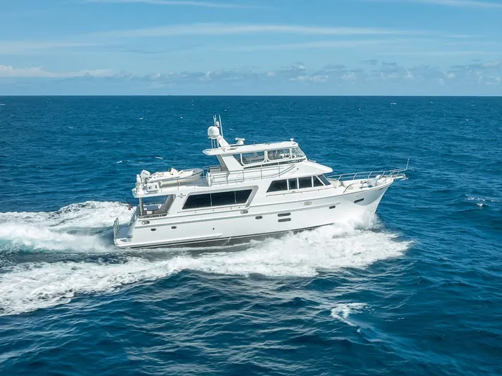 Sunny Seajay Yacht Photos Pics 2022 Hampton 658l Endurance yacht cruising on open ocean waters.