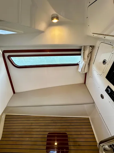 Key East Yacht Photos Pics 2023 MJM 3 interior cabin with wood flooring and modern design.