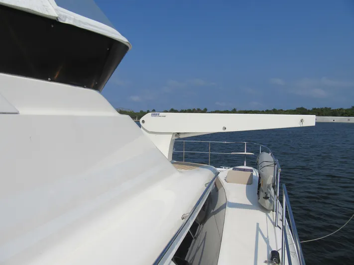 Africa 3 Yacht Photos Pics Africat Marine 420 yacht, 2008 model, cruising on calm waters under a clear blue sky.