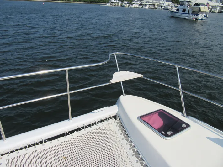 Africa 3 Yacht Photos Pics Africat Marine 420 yacht deck view on calm waters, 2008 model.