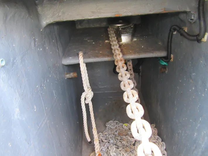 Africa 3 Yacht Photos Pics Anchor chain and rope storage on 2008 Africat Marine 420 boat.