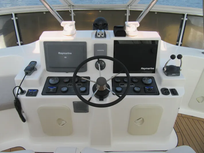 Africa 3 Yacht Photos Pics Africat Marine 420 helm with Raymarine navigation, 2008 model.