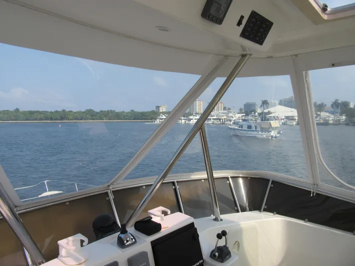 Africa 3 Yacht Photos Pics View from Africat Marine 420 yacht, 2008, overlooking marina and waterfront buildings.