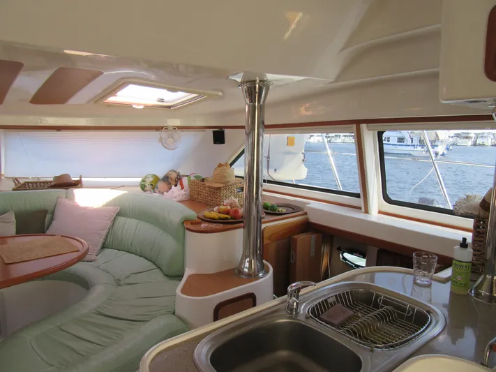 Africa 3 Yacht Photos Pics Luxurious 2008 Africat Marine 420 yacht interior with plush seating and modern kitchen.