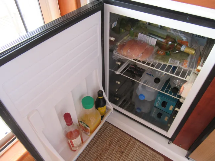 Africa 3 Yacht Photos Pics Open fridge on Africat Marine 420 yacht, stocked with drinks and food, 2008 model.