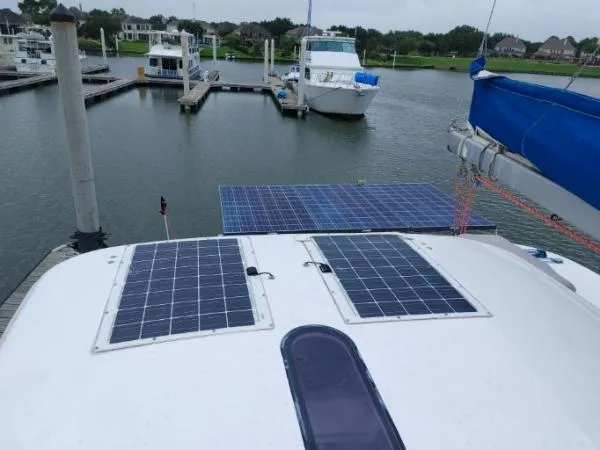 Titan 46 Yacht Photos Pics Sailboat with solar panels docked at marina, Leopard 46 model, 2011.