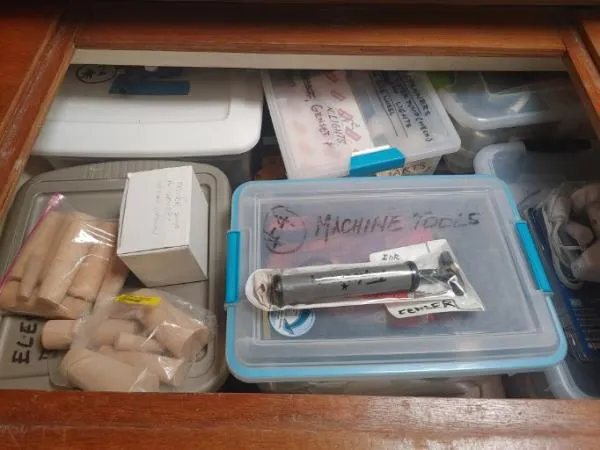 Titan 46 Yacht Photos Pics Storage compartment with labeled boxes and tools on a Leopard 46, 2011 model.