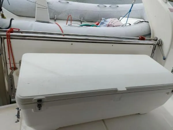 Titan 46 Yacht Photos Pics White storage box on Leopard 46 yacht deck, with inflatable boat in background.