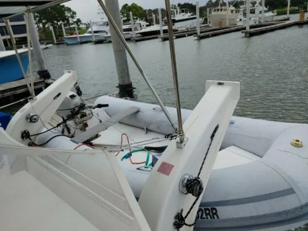 Titan 46 Yacht Photos Pics Inflatable dinghy on Leopard 46 yacht, docked at marina, overcast day, 2011 model.