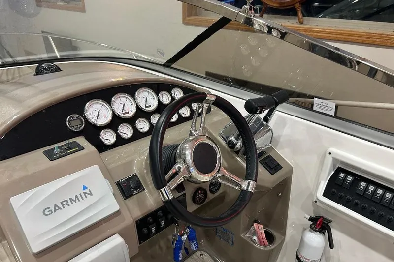  Yacht Photos Pics 2017 Regal 30 Express boat dashboard with Garmin navigation and control instruments.