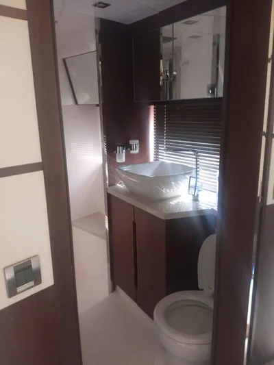 Sadeen Yacht Photos Pics Luxurious bathroom in 2016 Galeon 550 Fly yacht with modern fixtures and elegant design.