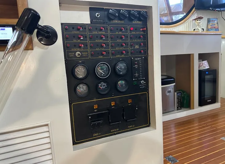  Yacht Photos Pics Control panel of a 1994 President 445 Sundeck yacht with gauges and switches.