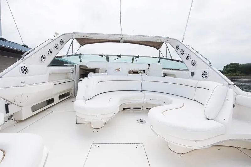  Yacht Photos Pics 1998 Sea Ray 500 Sundancer yacht with spacious white seating area and open deck.