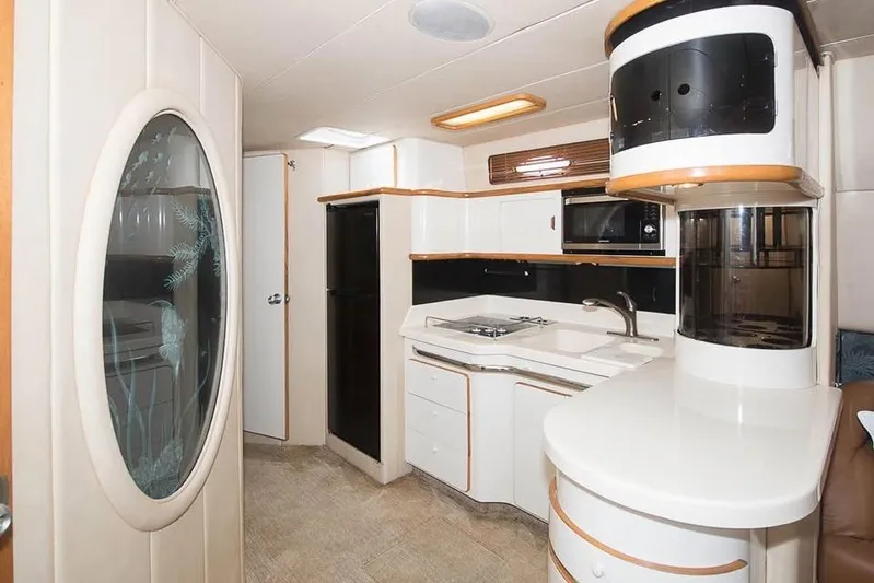  Yacht Photos Pics Interior of 1998 Sea Ray 500 Sundancer yacht with modern kitchen amenities.