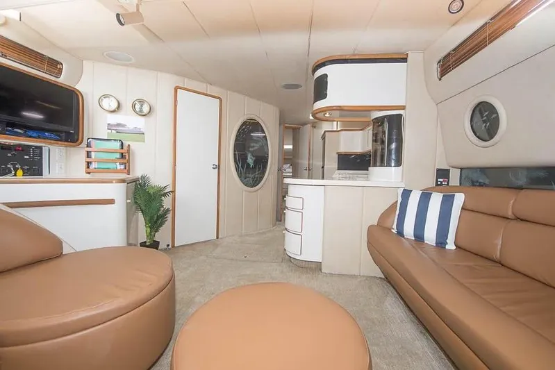  Yacht Photos Pics Luxurious interior of 1998 Sea Ray 500 Sundancer yacht with modern furnishings.